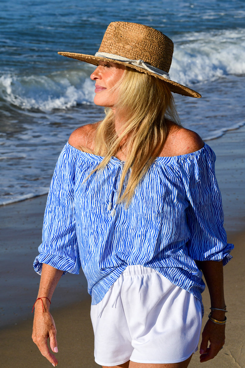 Blue and white peasant top on sale